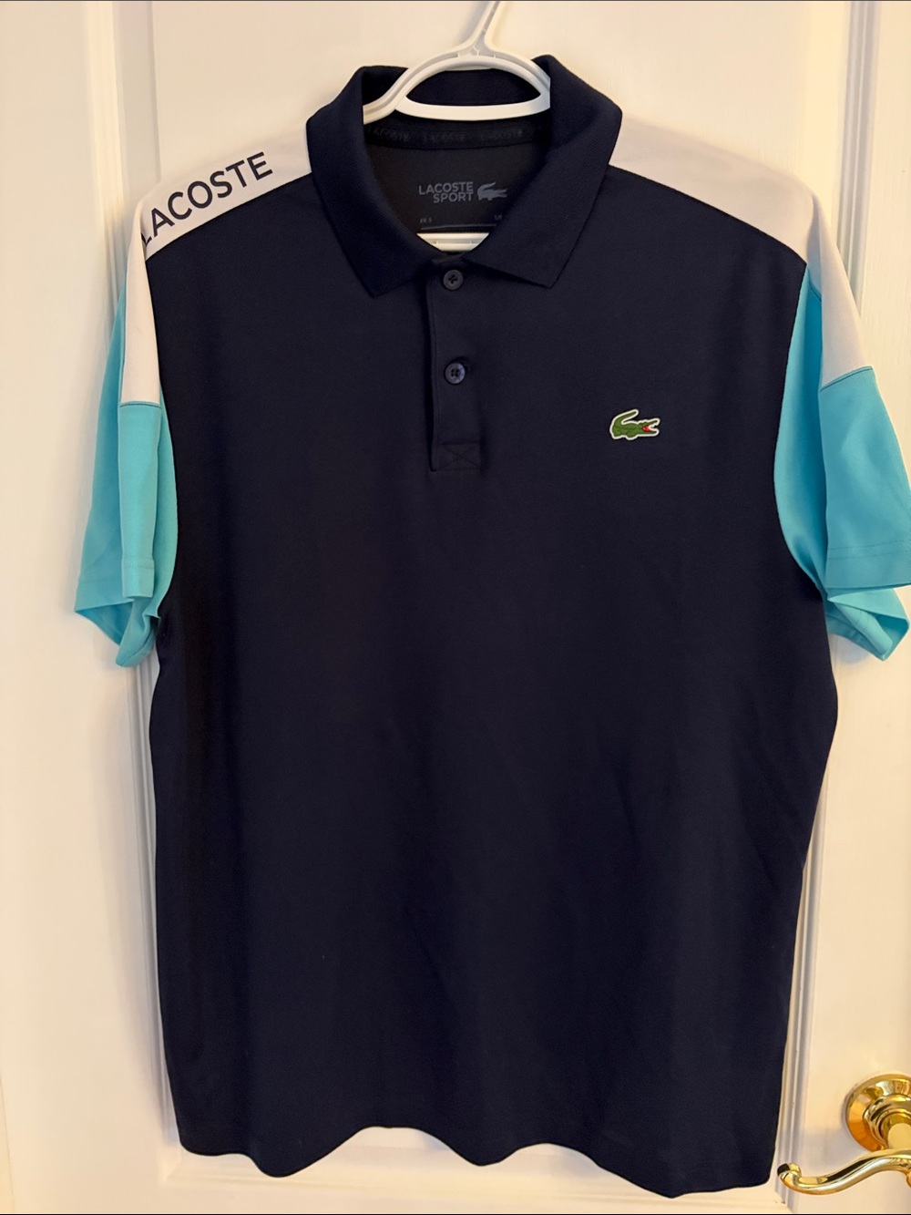 Lacoste Sport Ultra Dry Men’s Navy Polo with White & Aqua Colorblock Sleeves EC